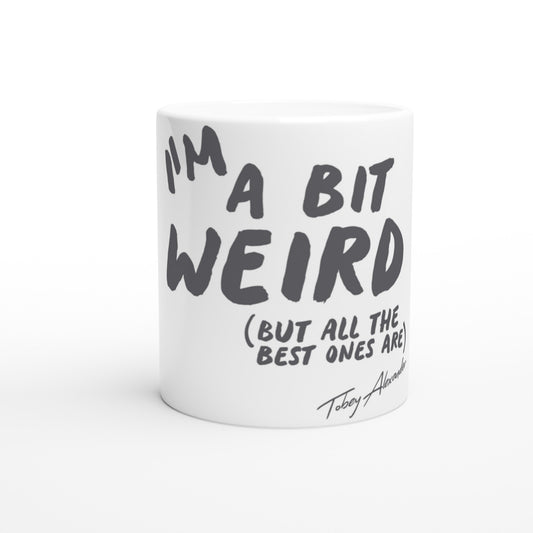 Be Proud, Be Weird! Embrace Your Quirkiness with our 11oz Ceramic Mug Clothes by Tobey Alexander